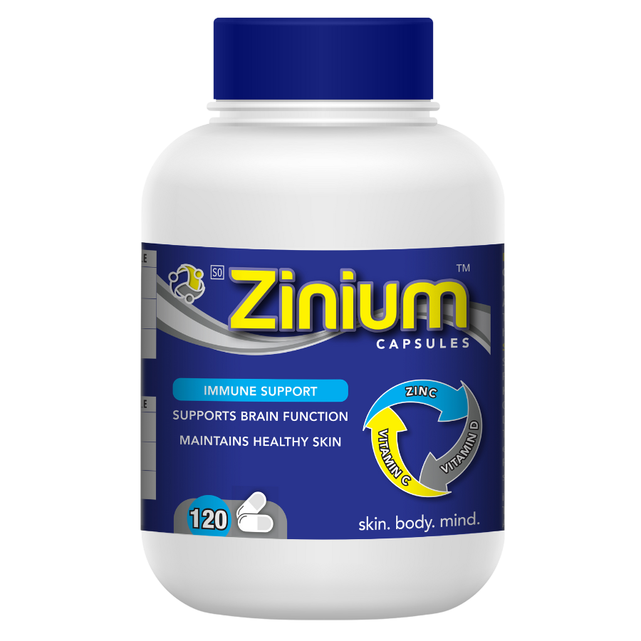 Zinium capsules bottle with blue and white label on a white background