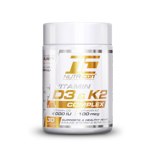 A container of Nutricon Vitamin D3+K2 Complex, featuring 30 capsules. The packaging is white with gold and black text, and the product is said to support healthy immune, muscle, and bone function.