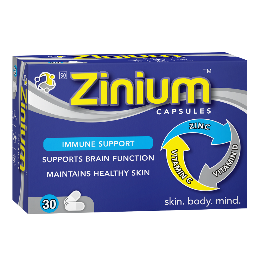 Zinium capsules packaging with blue and yellow design on a white background
